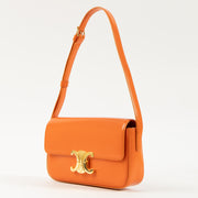 Shop this authentic Celine Orange Shiny Calfskin Claude Shoulder Bag pre-loved on Labellov.com