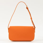 Shop this authentic Celine Orange Shiny Calfskin Claude Shoulder Bag pre-loved on Labellov.com