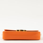 Shop this authentic Celine Orange Shiny Calfskin Claude Shoulder Bag pre-loved on Labellov.com