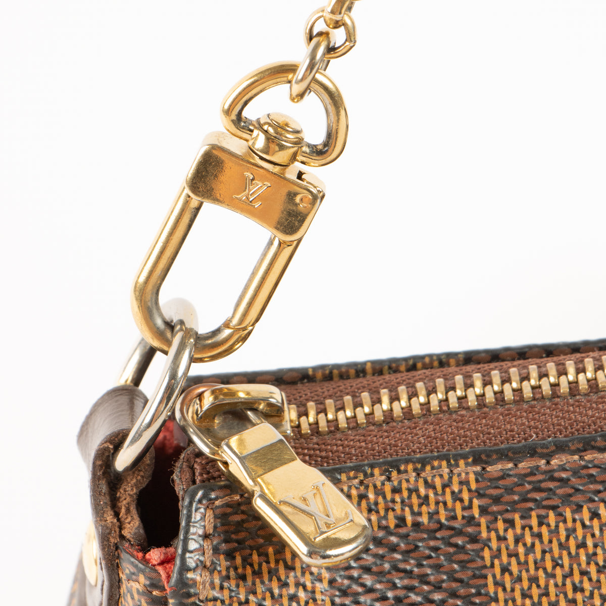 Shop the authentic Louis Vuitton Damier Ebene Eva Pochette Bag second hand on Labellov.com!