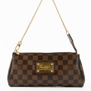 Shop the authentic Louis Vuitton Damier Ebene Eva Pochette Bag second hand on Labellov.com!