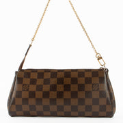 Shop the authentic Louis Vuitton Damier Ebene Eva Pochette Bag second hand on Labellov.com!