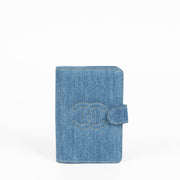 Shop this 100% authentic Chanel Blue Denim Passport Holder at Labellov.com