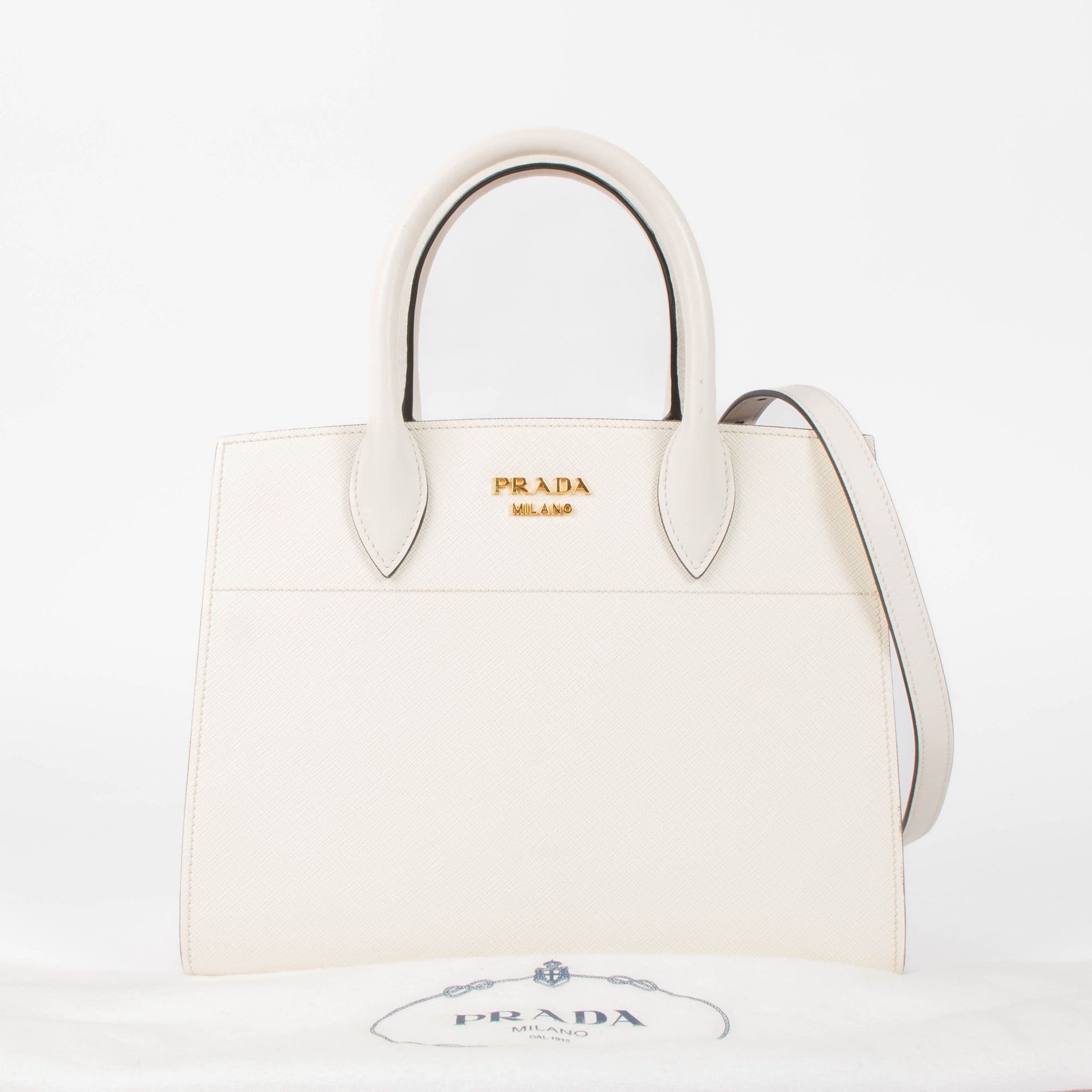 Shop this authentic Prada White/Pink Small Bibliothèque Tote pre-loved on Labellov.com 