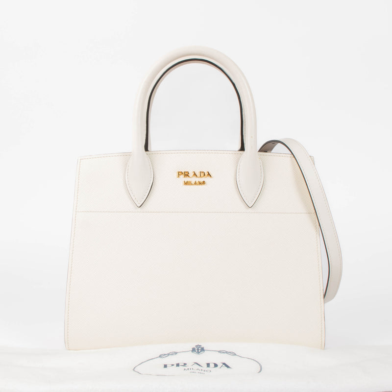 Shop this authentic Prada White/Pink Small Bibliothèque Tote pre-loved on Labellov.com 