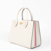 Shop this authentic Prada White/Pink Small Bibliothèque Tote pre-loved on Labellov.com 