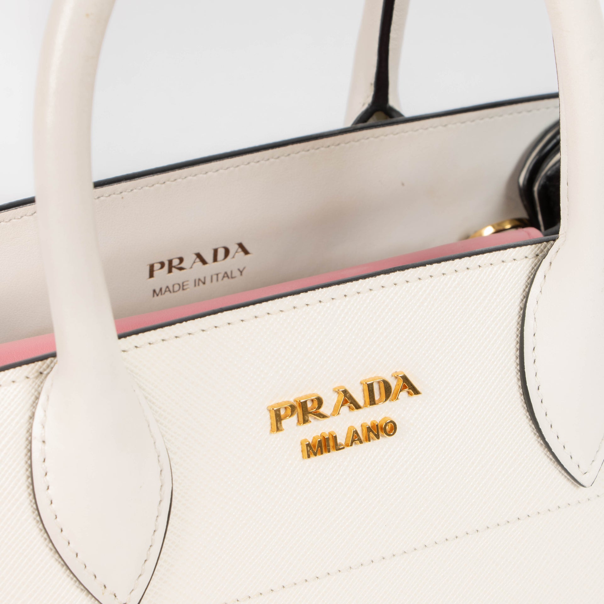 Shop this authentic Prada White/Pink Small Bibliothèque Tote pre-loved on Labellov.com 