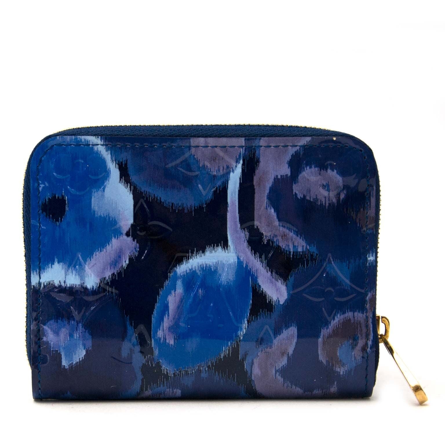 Second main Louis Vuitton Ikat portefeuille