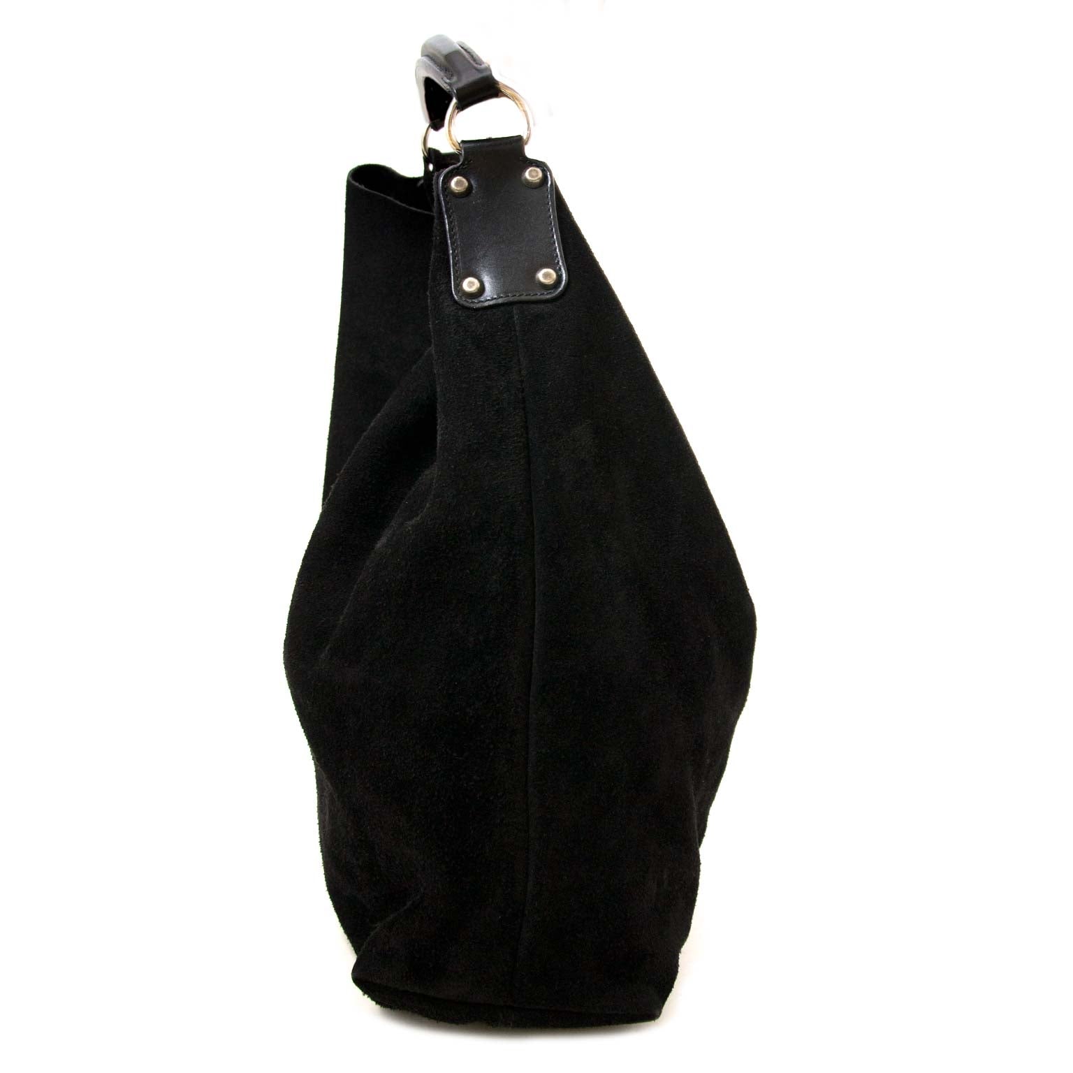 veilig online shoppen bij labellov vintage mode webshop met balenciaga suede hobo tassen