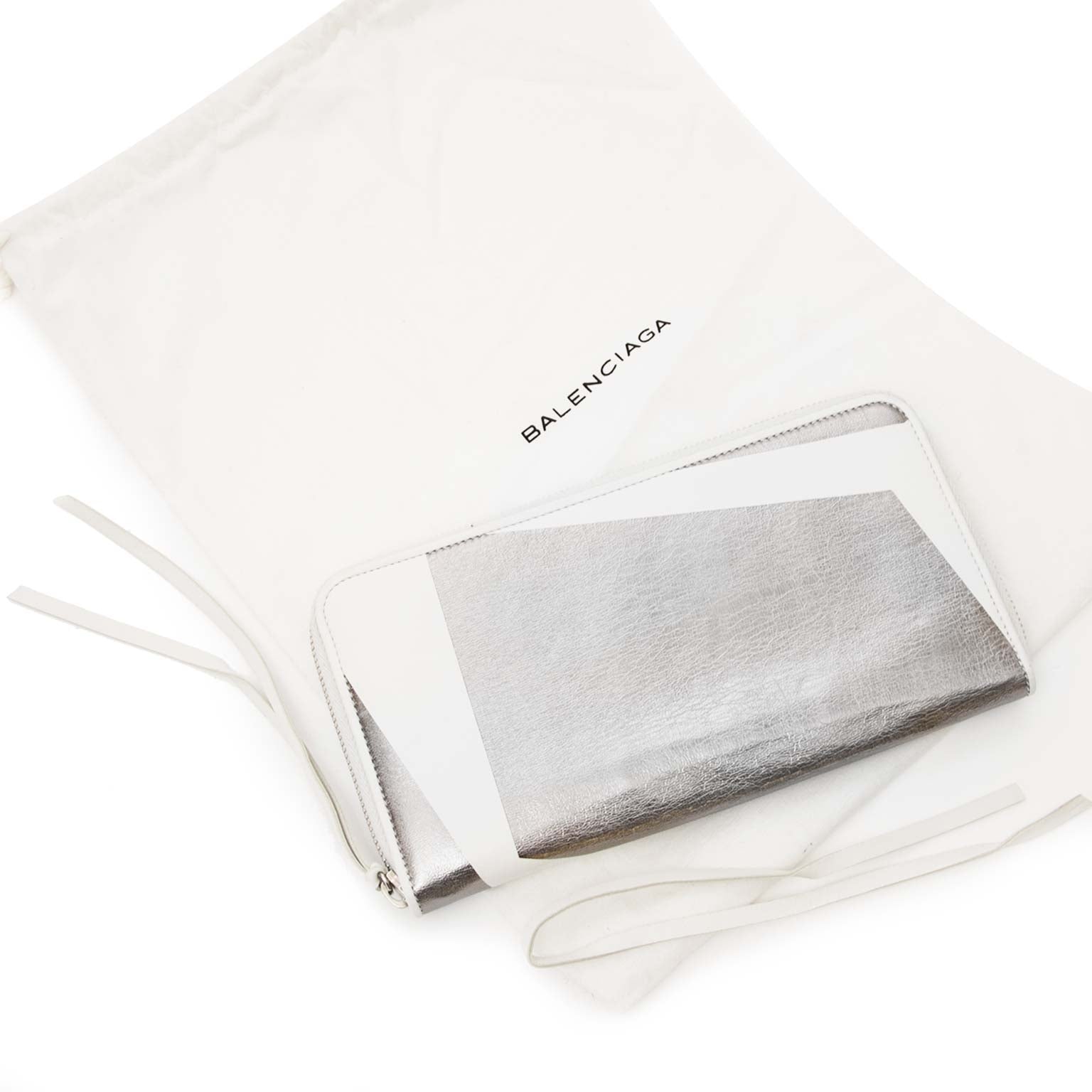 balenciaga metallic zip around wallet now for sale at labellov vintage fashion webshop belgium