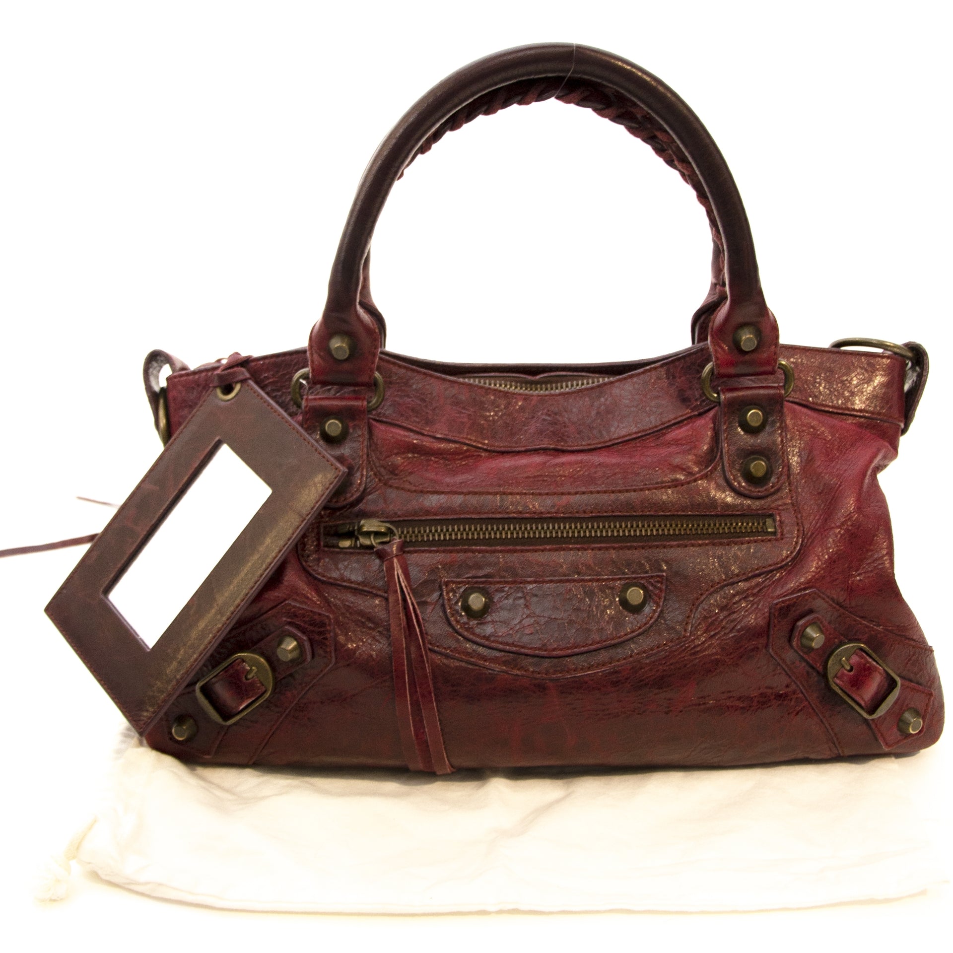 Balenciaga Burgundy Nano City Bag Buy and sell vintage handbags and fashion accessories at Labellov Antwerp. Koop en verkoop handtassen bij Labellov Antwerpen, webshop en winkel. Betaal veilig en eerlijk. Vente et achat de sac a mains vintage.