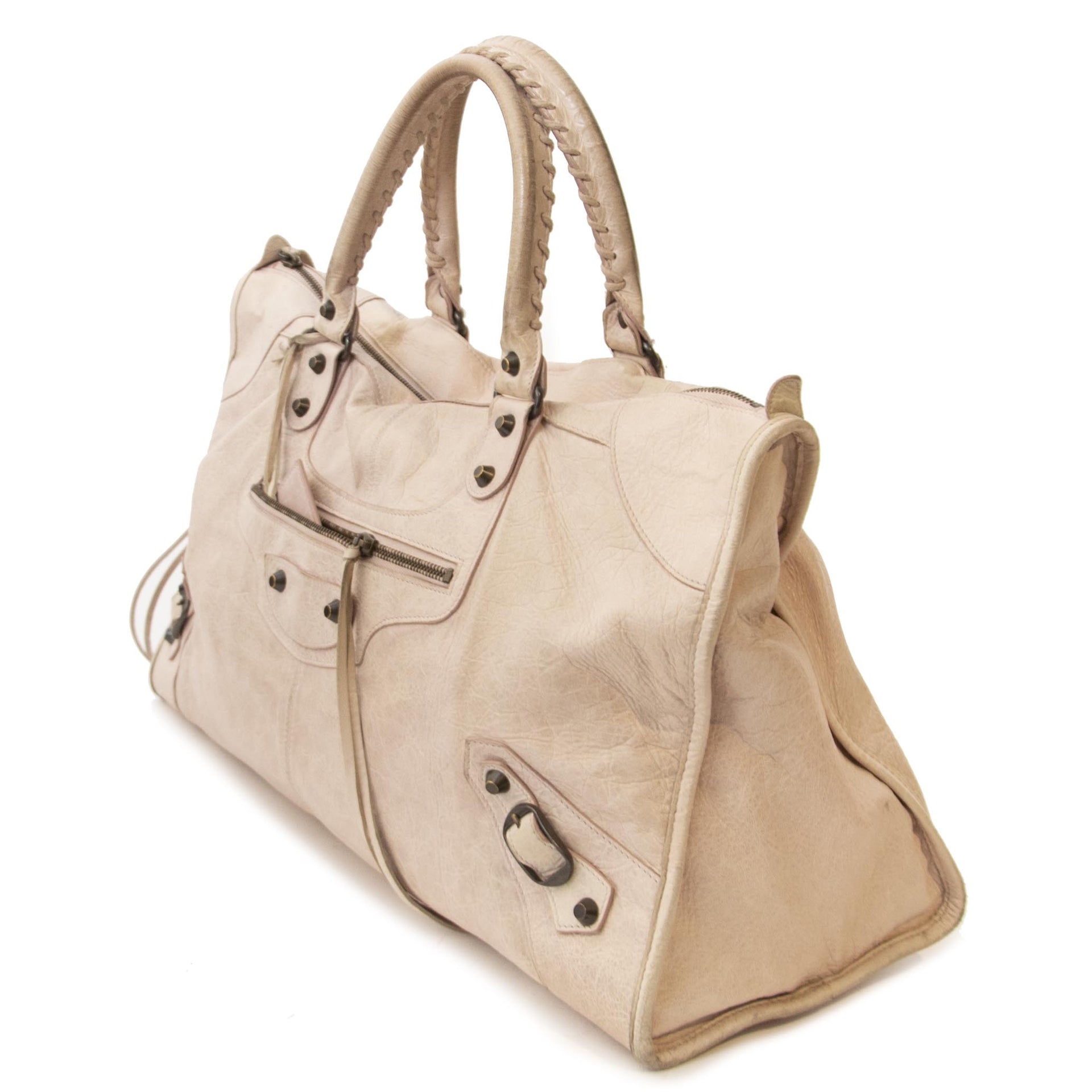 We buy and sell your authentic Balenciaga Blush Pink Work Bag for the best price online