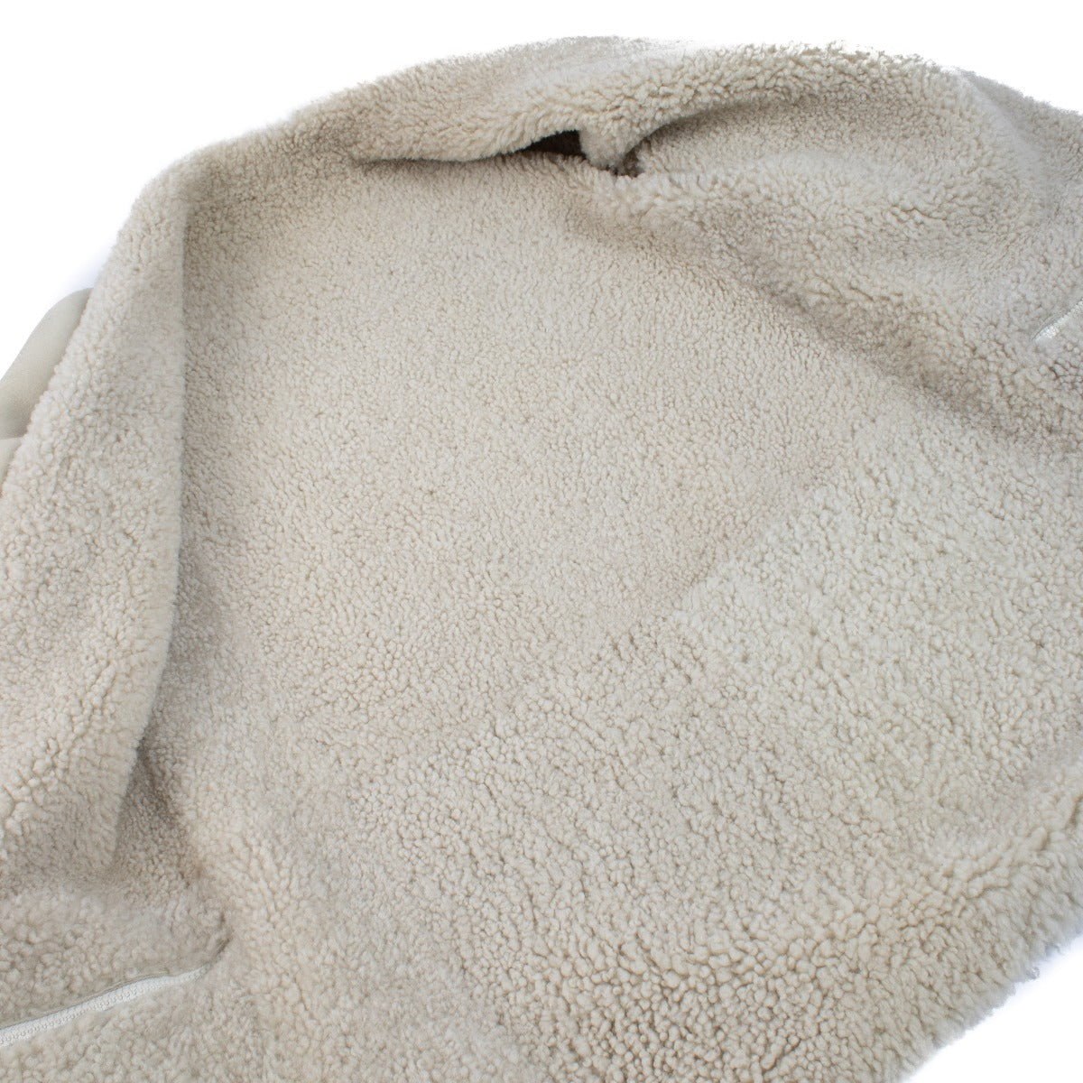 Manteau en peau lainée beige