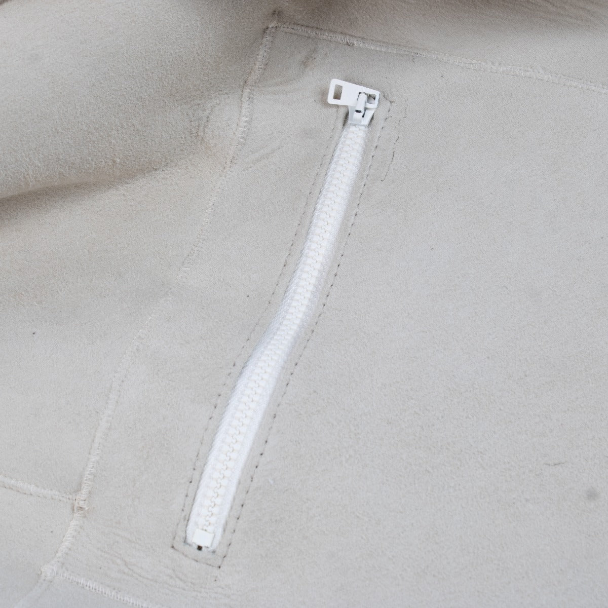 Manteau en peau lainée beige