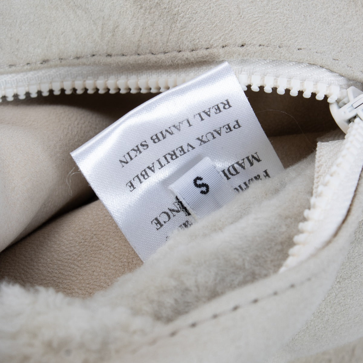Manteau en peau lainée beige