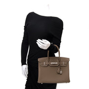 Skip the waiting list and land yourself this exclusive BRAND NEW Hermès Birkin 30 Etoupe Togo PHW for the best price