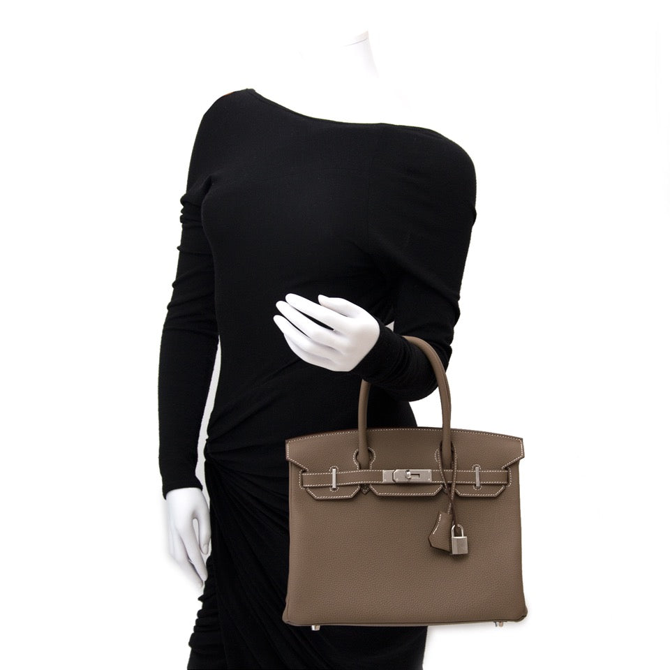 Skip the waiting list and land yourself this exclusive BRAND NEW Hermès Birkin 30 Etoupe Togo PHW for the best price