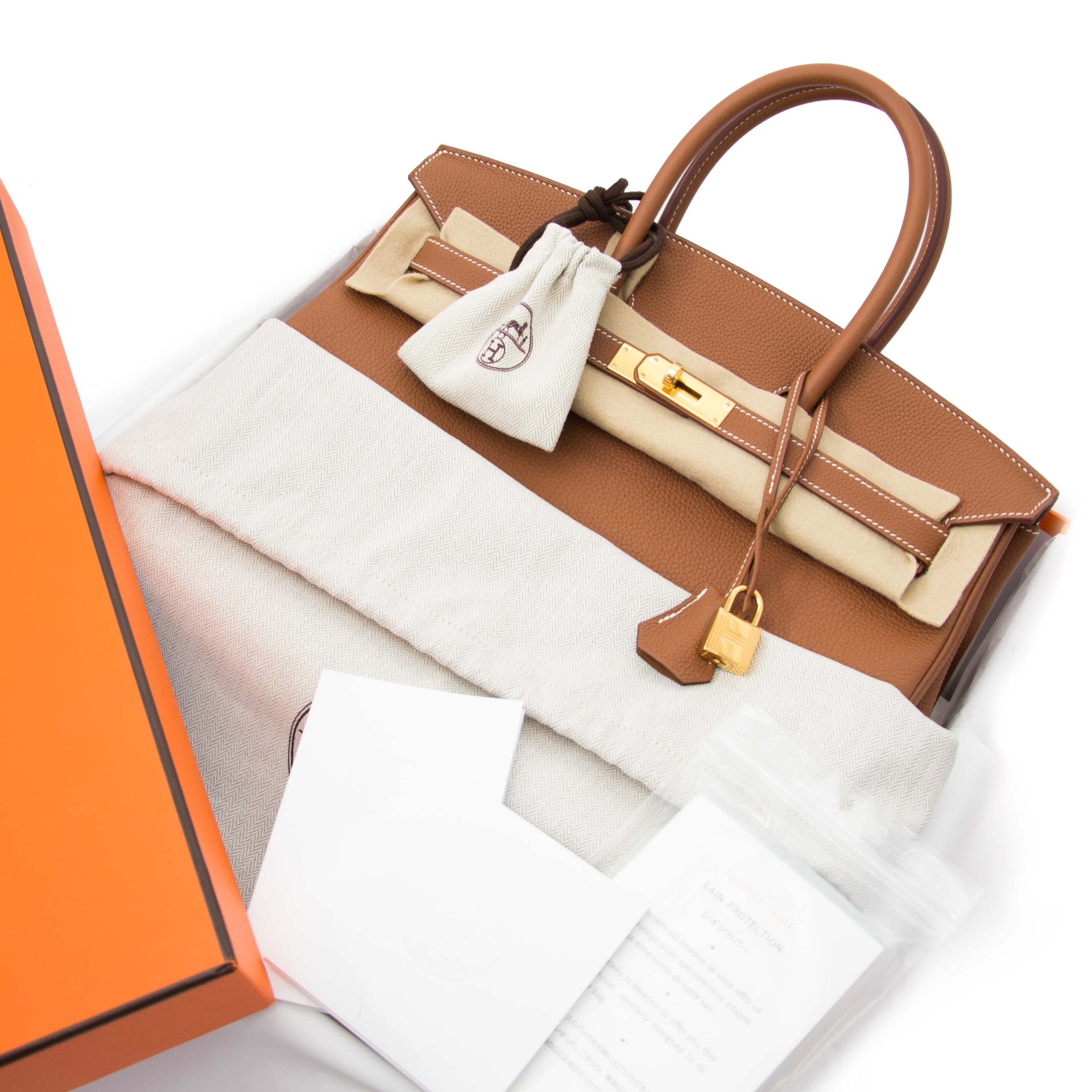 searching for a 100% authentic Never Used Hermes Birkin 35 Gold Togo worldwide shipping