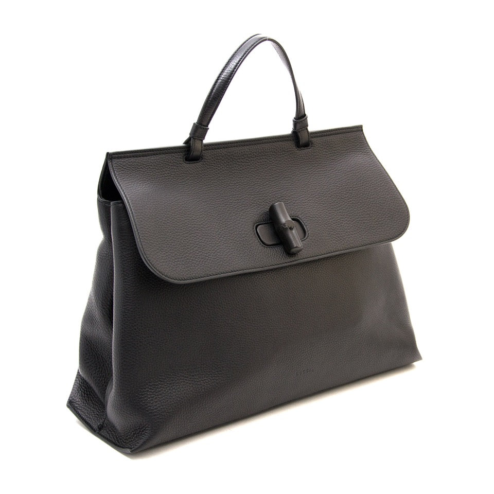 Looking for a new secondhand designer bag for a good price? Shop your Gucci Bamboo Daily Leather Top Handle Bag on Labellov