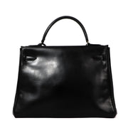 Look at this stunning hermes in black boxcalf leather with golden hardware.