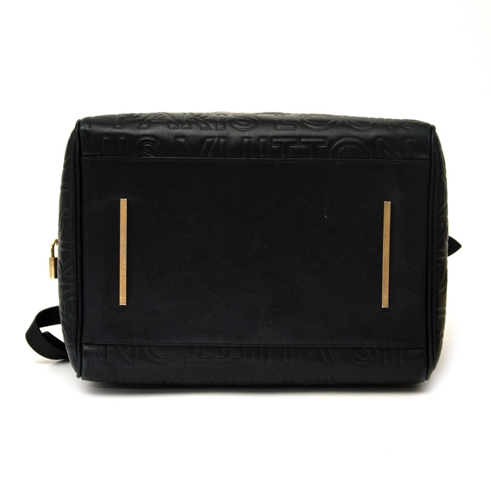 koop veilig online aan de beste prijs Louis Vuitton Limited Edition Black Embossed Leather Speedy Cube Bag
