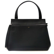 Buy an authentic Céline Boxcalf Black Edge Bag at the right price at LabelLOV vintage webshop. Safe and secure online shopping.