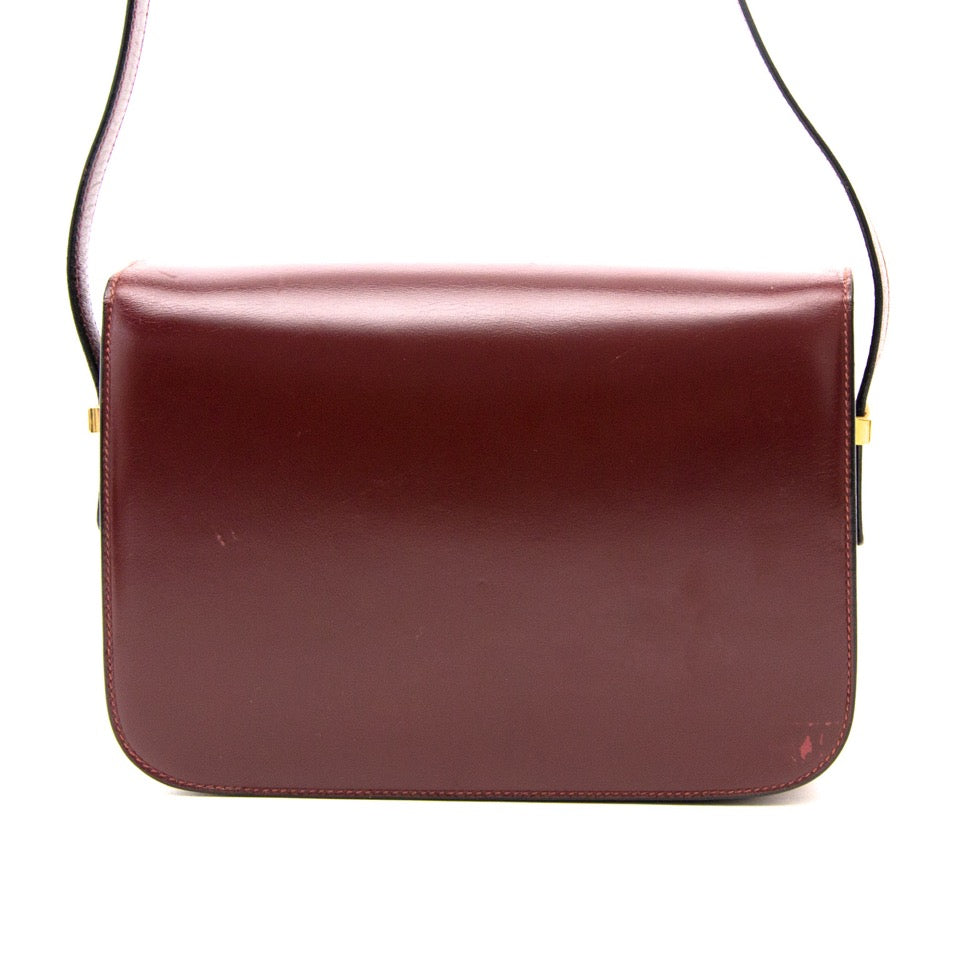 We buy and sell your Vintage Céline Burgundy Box Bag for the best price