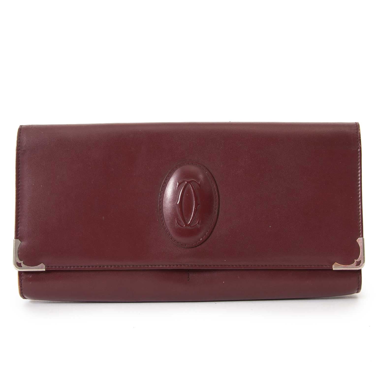 Cartier Burgundy Leather Clutch Bag for the best price at Labellov secondhand luxury