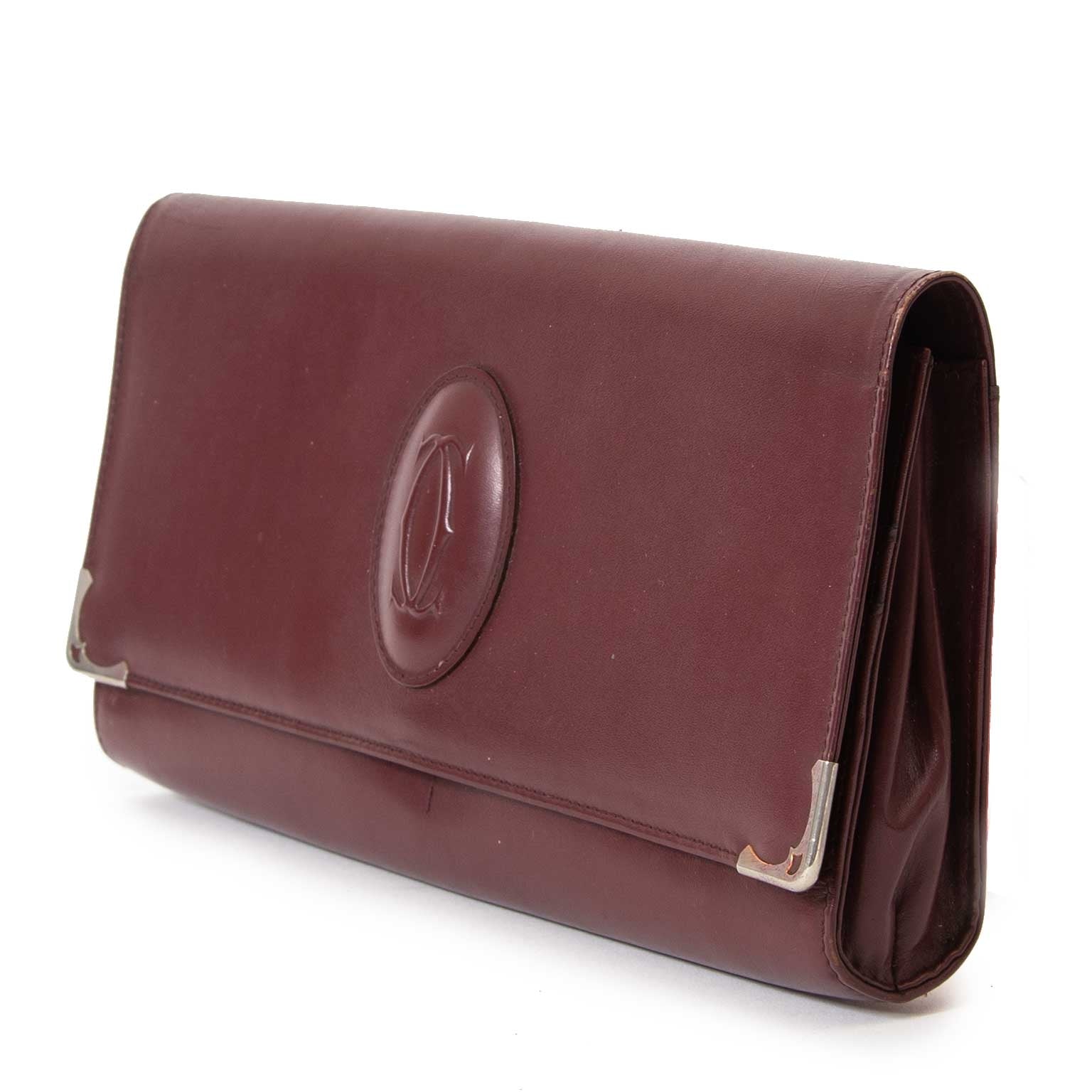 Buy you authentic preloved designer bag online Cartier Burgundy Leather Clutch Bag