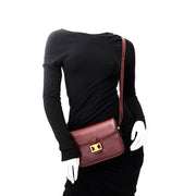 We buy and sell your Vintage Céline Burgundy Box Bag for the best price