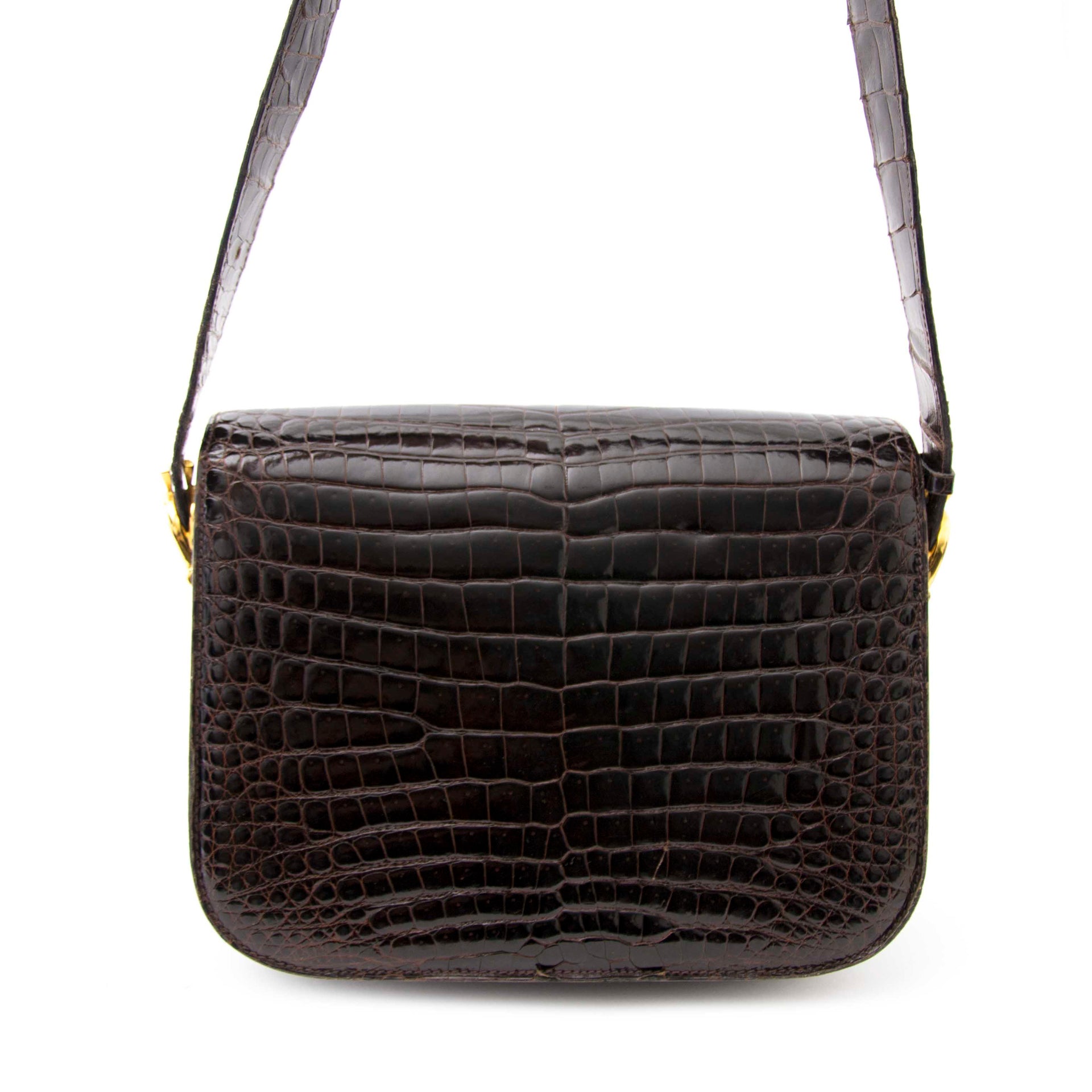 We buy and sell your authentic Céline Vintage Croco Horse Box Bag