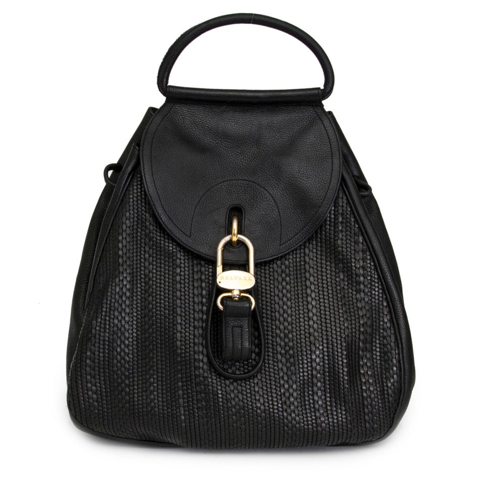 Buy Delvaux Black cerceau toile de cuir backpack at the right price at LabelLOV vintage webshop. Luxe, vintage, fashion. Safe and secure online shopping. Antwerp, Belgium.