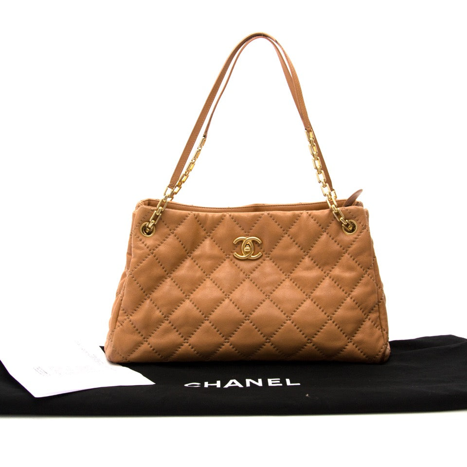 100% authentieke Chanel GST Grand Shopping Tote in beige leder met gouden hardware aan de beste prijs