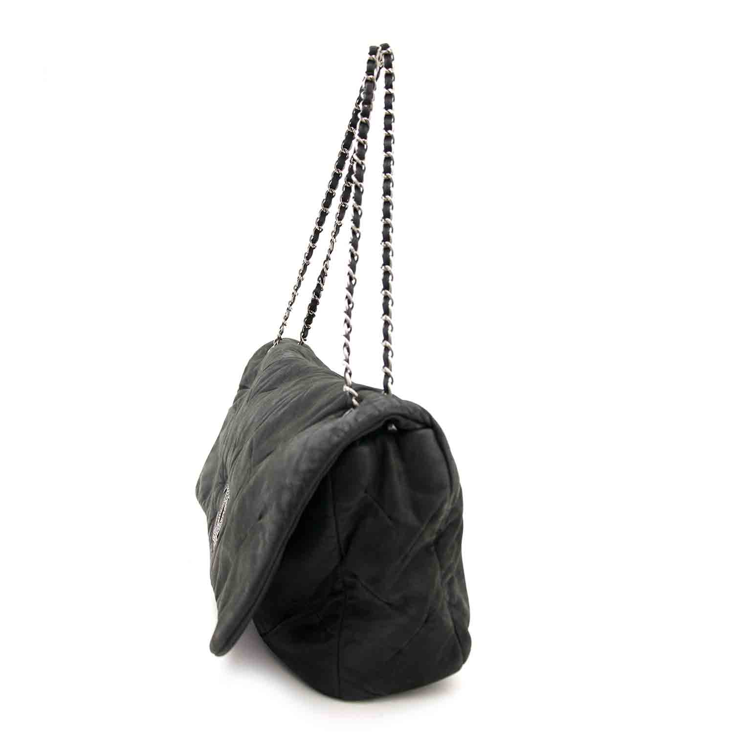 We buy and sell your designer handbags and accessories such as Chanel Black Leather Flap Bag