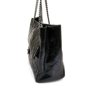 Side way of the authentic Chanel Glazed Calfskin Shopper Flap Tote available at Labellov