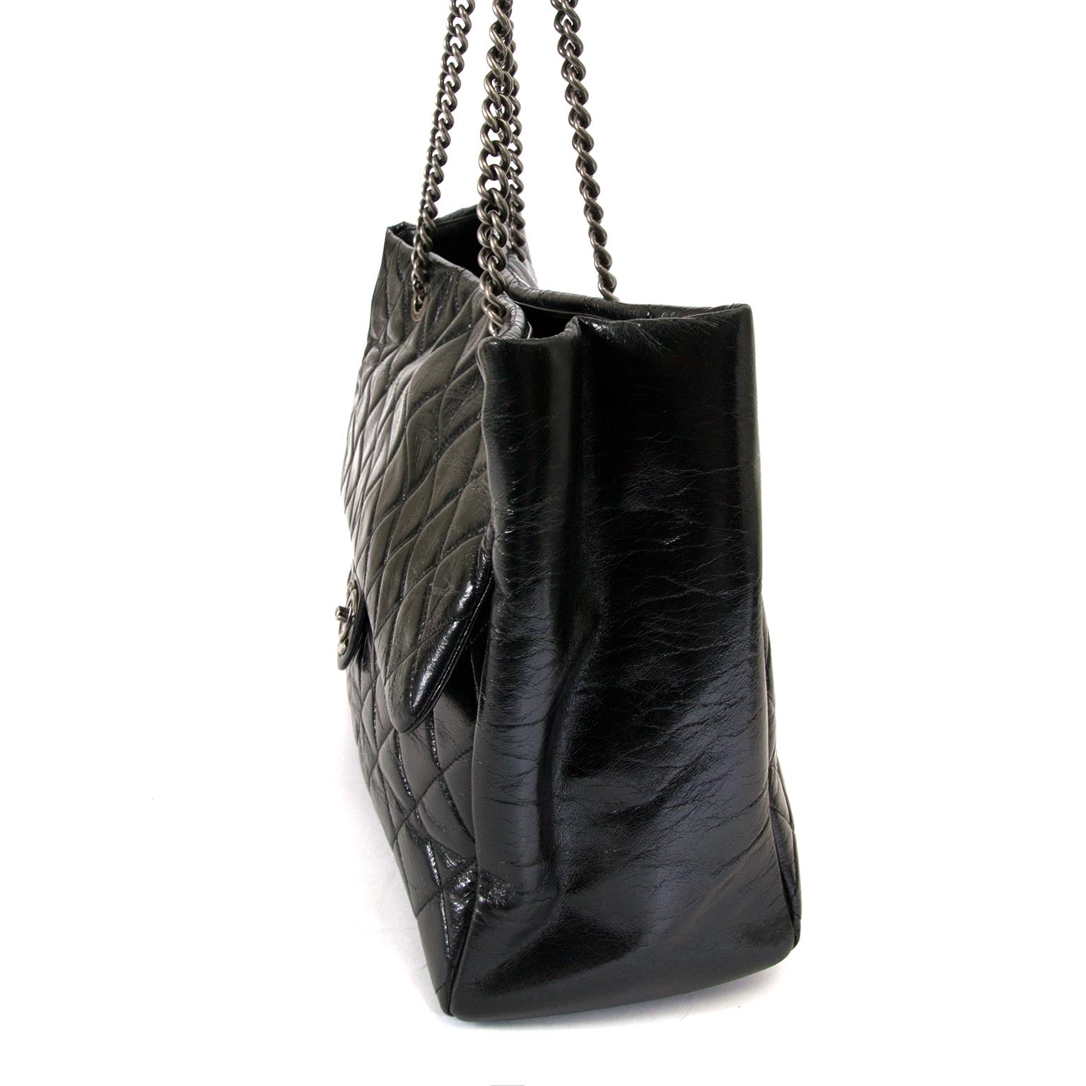 Side way of the authentic Chanel Glazed Calfskin Shopper Flap Tote available at Labellov