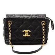 We buy and sell your authentic Chanel Black Surpique Chain Bag for the best price.