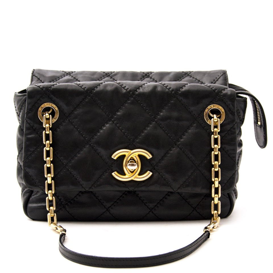 We buy and sell your authentic Chanel Black Surpique Chain Bag for the best price.