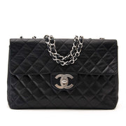 searching for a vintage luxury bag Chanel Vintage Maxi Black Classic Flap Bag