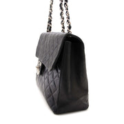 shop online your seconde main your luxury Chanel Vintage Maxi Black Classic Flap Bag