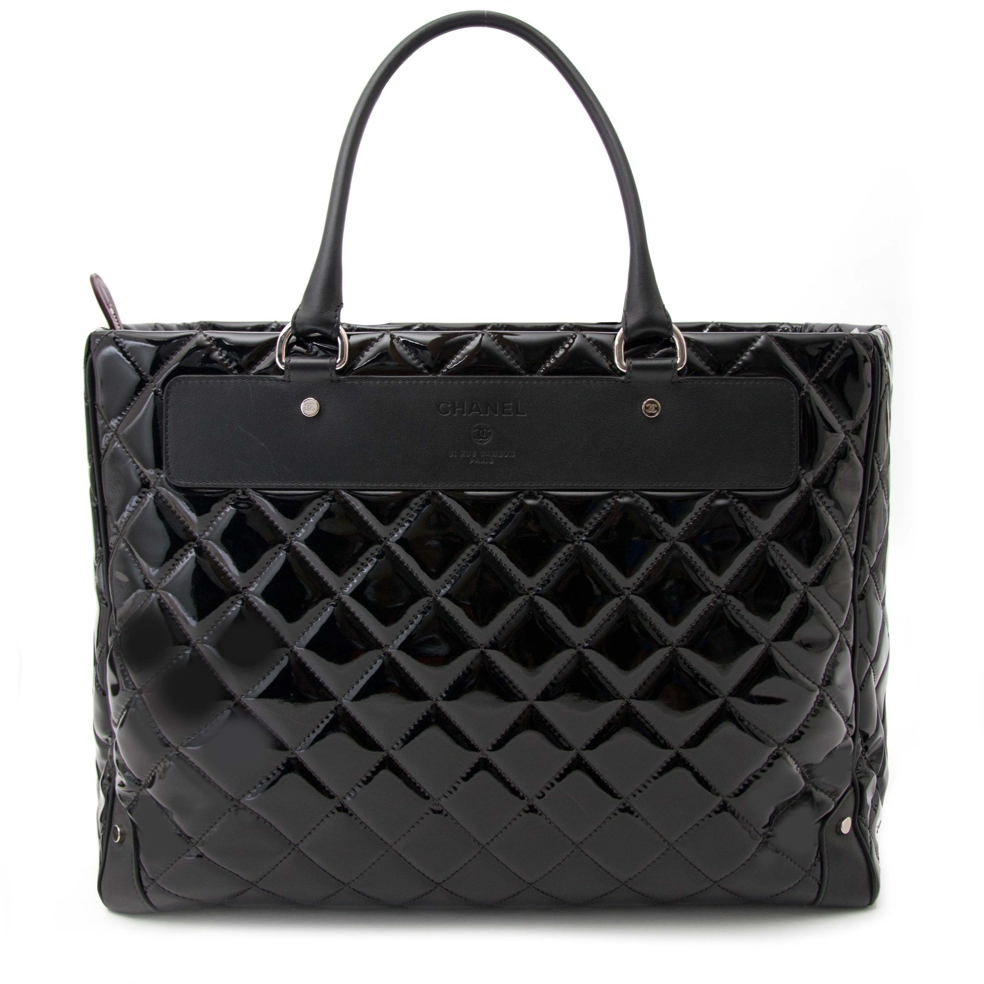 Buy your authentic 2015 collection Chanel Vinyl Quilted Calfskin Travel Tote for sale online at Labellov