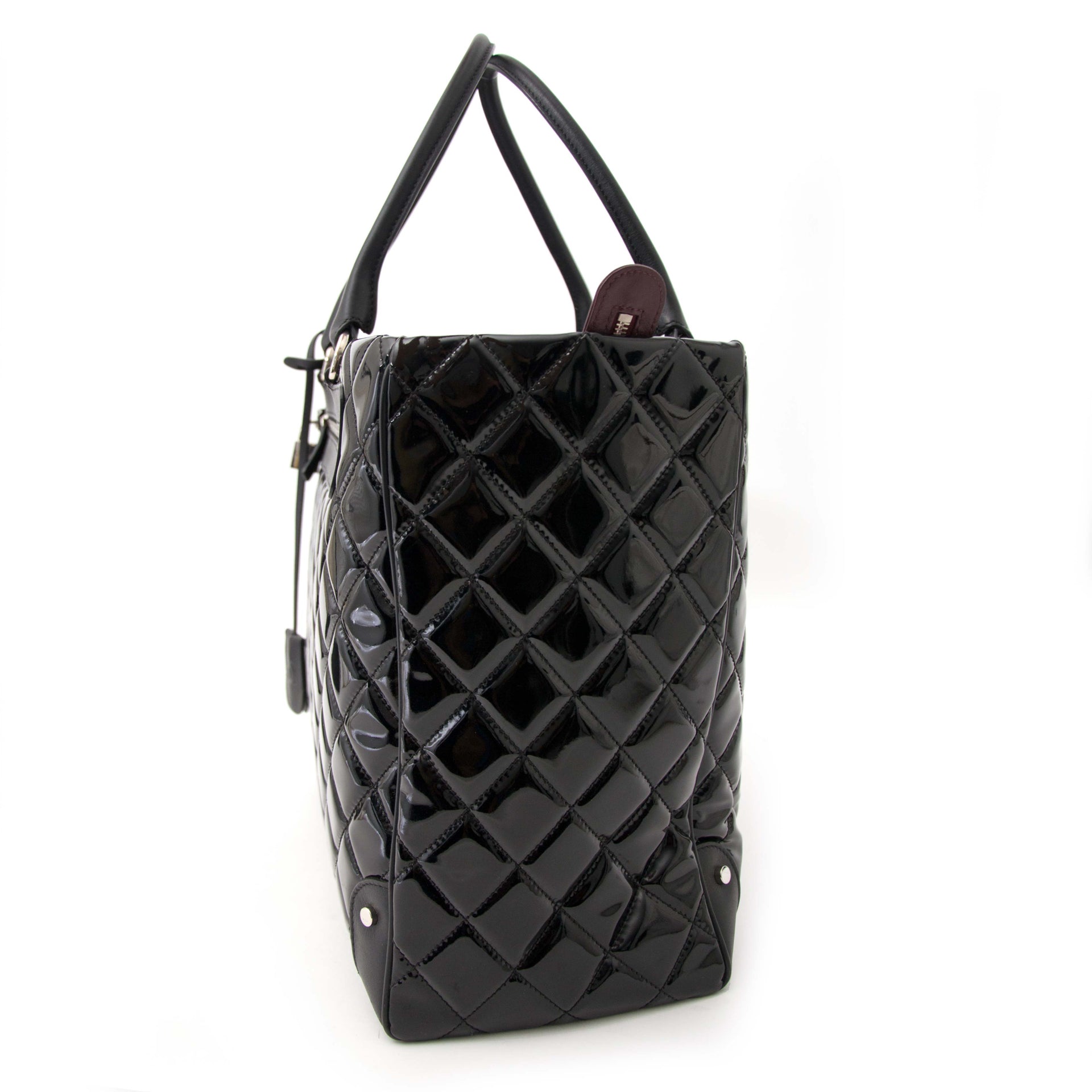 Buy and sell authentic Chanel Vinyl Quilted Calfskin Travel Tote