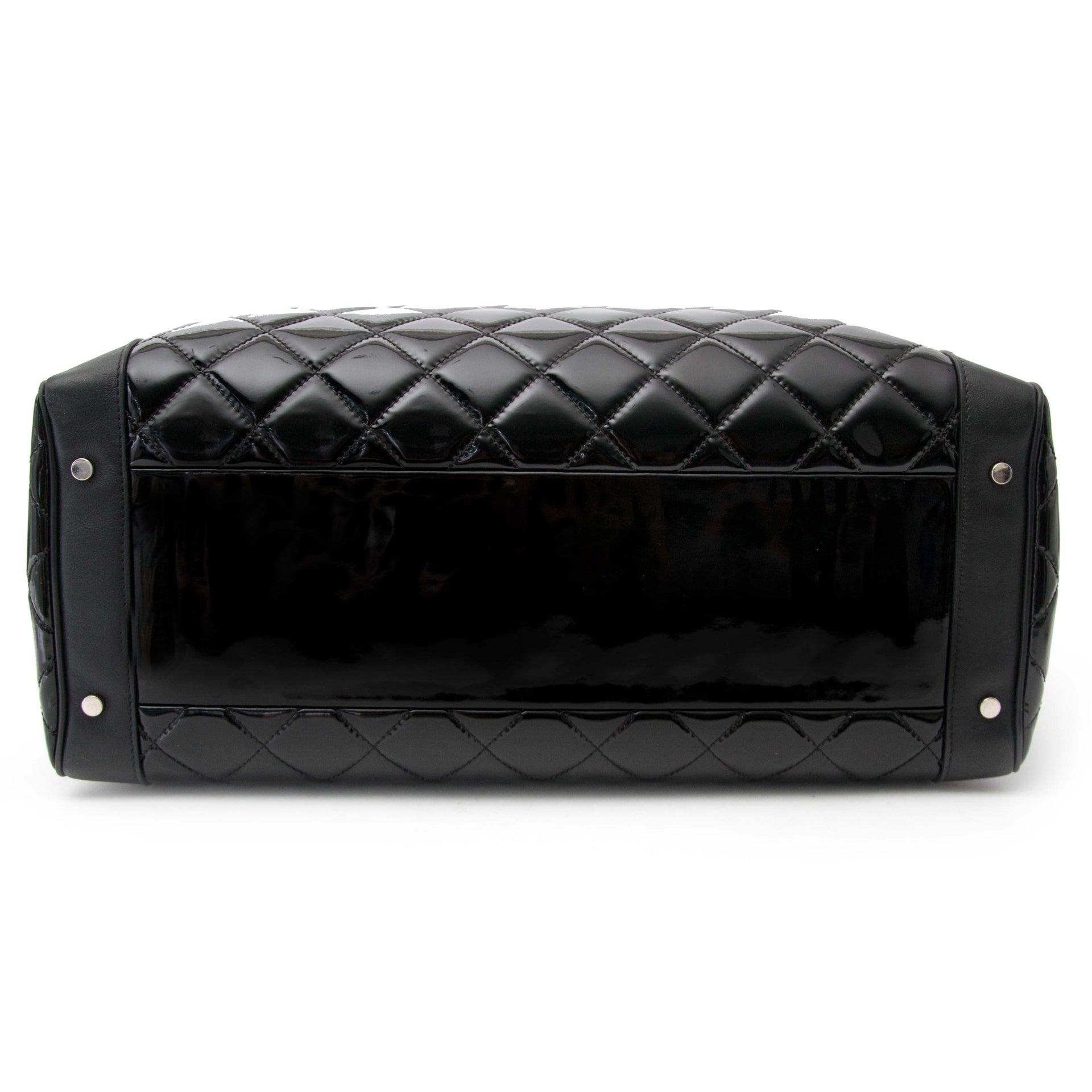 Chanel Vinyl Quilted Calfskin Travel Tote for sale en ligne chez labellov