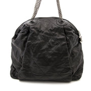 Buy the Chanel Black Limited Edition Metallic Chain Shopping Tote now, the ultimate shopping tote. Chanel is always a good idea, designer vintage at Labellov.