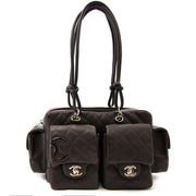 Buy an authentic secondhand Chanel brown pocket bag in black at the right price at LabelLOV vintage webshop. Safe and secure online shopping.
