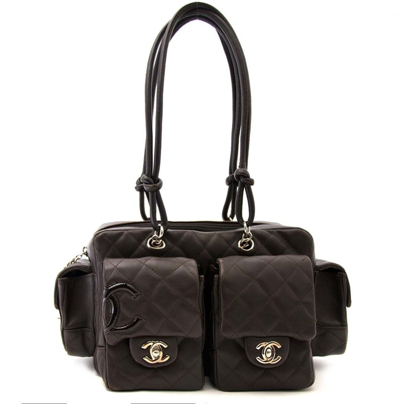 Buy an authentic secondhand Chanel brown pocket bag in black at the right price at LabelLOV vintage webshop. Safe and secure online shopping.