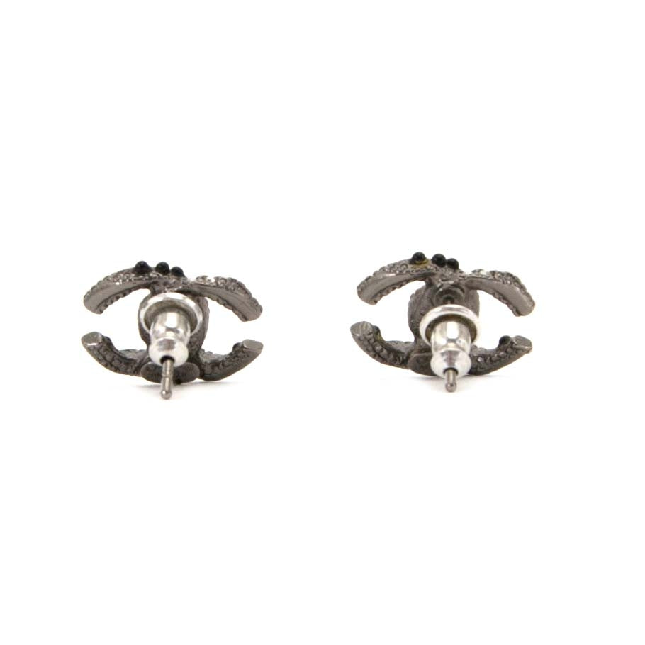 authentique seconde main Chanel CC Logo Silver Earrings en vendre chez labellov anvers au meilleur prix