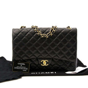 Chanel Black Lambskin Leather Maxi Classic Flap Bag GHW te koop