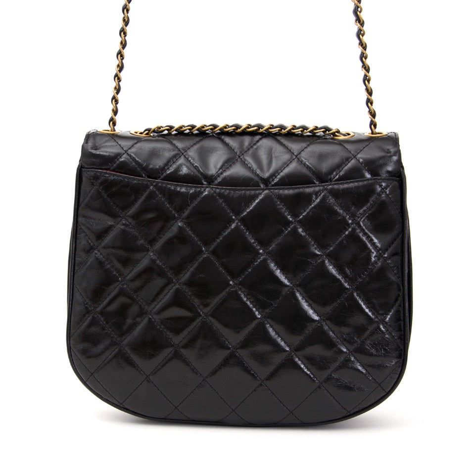acheter en ligne pour le meilleur prix comme neuf sac a main Chanel flap bag.