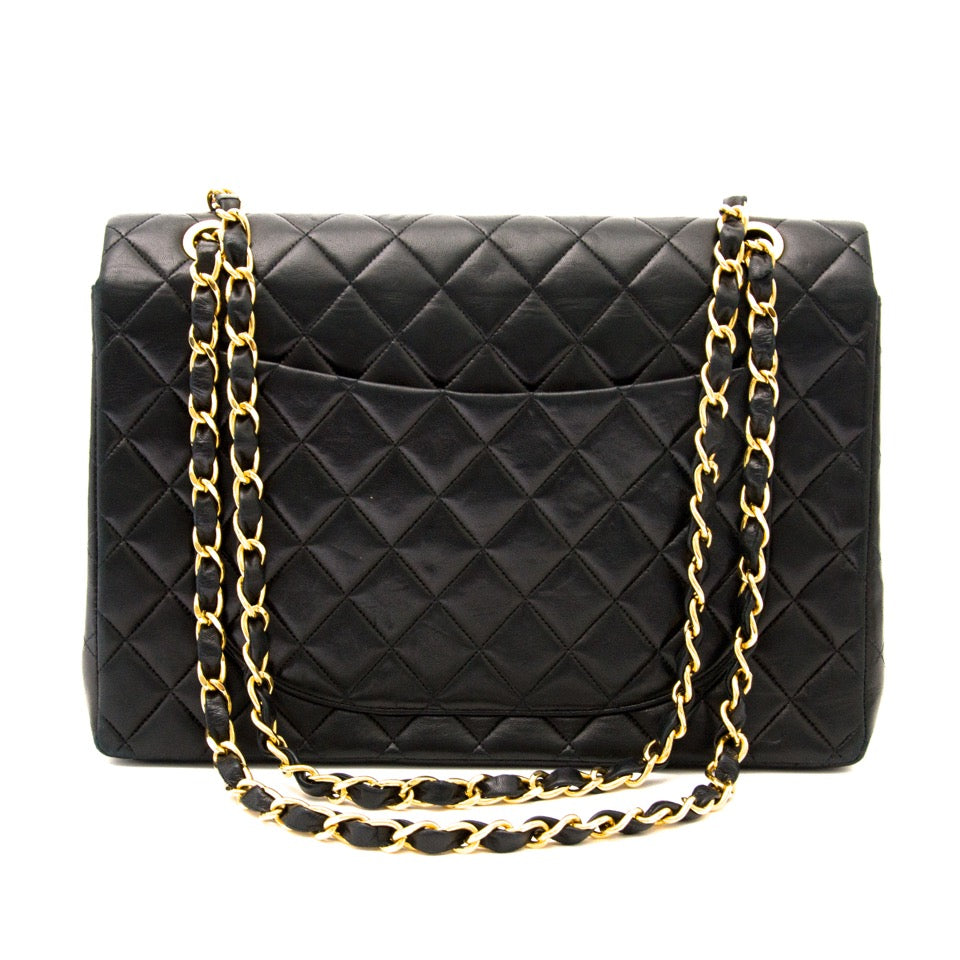 Secondhand Chanel Black Maxi Single Flap Bag in black leather and gold hardware for the best price